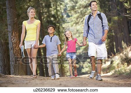 Family on country walk View Large Photo Image Stock Photo - Family on country walk. Fotosearch