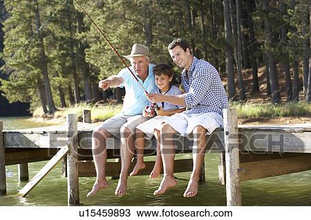 Father, son and grandson fishing together View Large Photo Image Stock Image - Father, son and grandson fishing together. Fotosearch