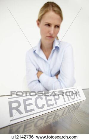 Stock Photograph - Female receptionist. Fotosearch