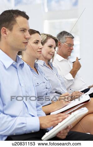 Group watching business presentation View Large Photo Image Stock Image - Group watching business presentation. Fotosearch