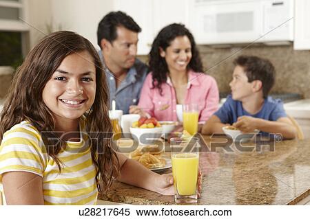 Hispanic family eating breakfast View Large Photo Image Stock Photography - Hispanic family eating breakfast. Fotosearch