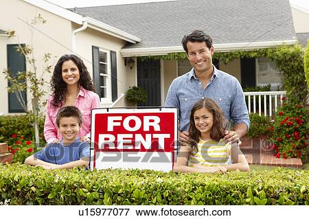 Hispanic family outside home for rent View Large Photo Image Stock Photo - Hispanic family outside home for rent. Fotosearch