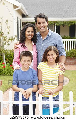 Hispanic family outside home View Large Photo Image Stock Photography - Hispanic family outside home. Fotosearch