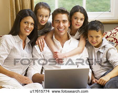 Hispanic family shopping online View Large Photo Image Picture - Hispanic family shopping online. Fotosearch