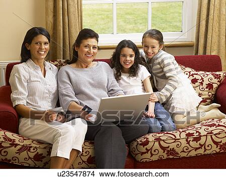 Hispanic family shopping online View Large Photo Image Picture - Hispanic family shopping online. Fotosearch