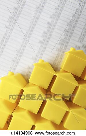 Little plastic houses on a spreadsheet View Large Photo Image Stock Photo - Little plastic houses on a spreadsheet. Fotosearch