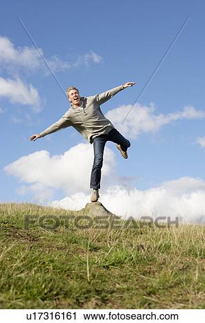 Man in countryside View Large Photo Image Stock Image - Man in countryside. Fotosearch