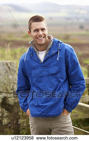 Stock Photo - Man in countryside. Fotosearch