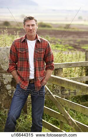 Man in countryside View Large Photo Image Stock Photography - Man in countryside. Fotosearch
