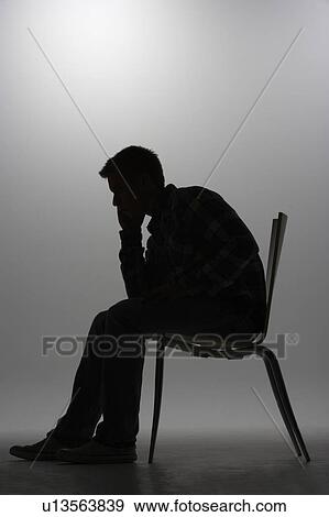 Stock Photo - Man in silhouette. Fotosearch