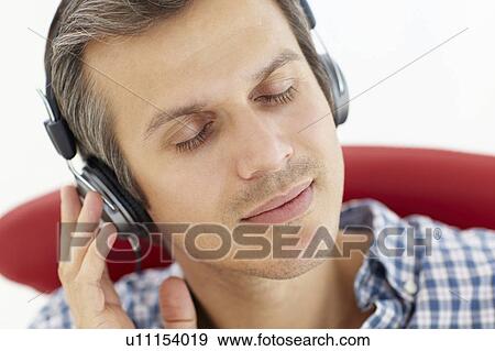 Man with headphones View Large Photo Image Stock Photo - Man with headphones. Fotosearch
