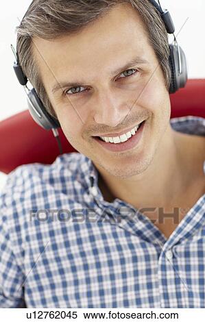Stock Photography - Man with headphones. Fotosearch
