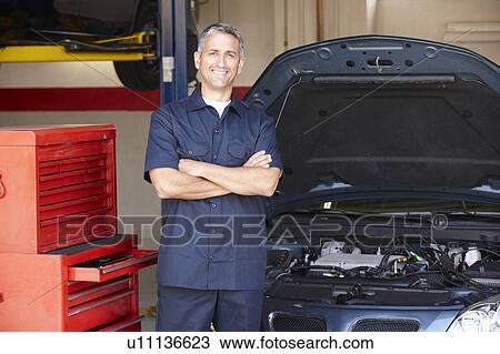 Mechanic at work View Large Photo Image Stock Image - Mechanic at work. Fotosearch