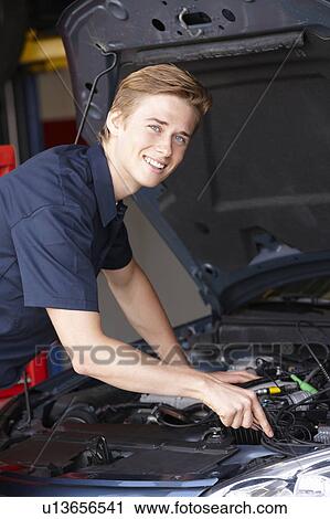 Mechanic at work View Large Photo Image Stock Image - Mechanic at work. Fotosearch