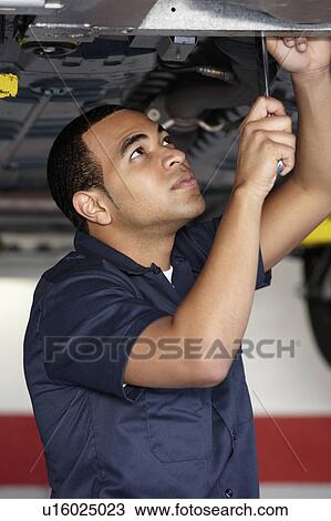 Stock Image - Mechanic at work. Fotosearch