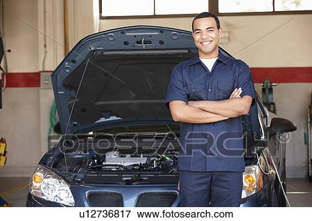 Mechanic at work View Large Photo Image Stock Photo - Mechanic at work. Fotosearch