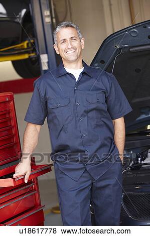 Stock Photo - Mechanic at work. Fotosearch