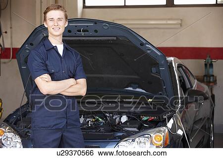 Stock Photograph - Mechanic at work. Fotosearch