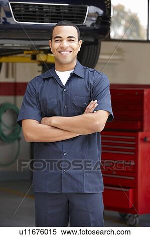 Stock Photography - Mechanic at work. Fotosearch