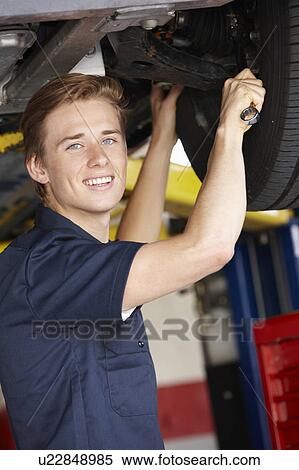 Mechanic at work View Large Photo Image Stock Photography - Mechanic at work. Fotosearch