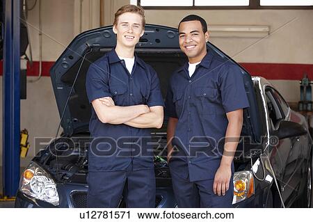 Stock Image - Mechanics at work. Fotosearch