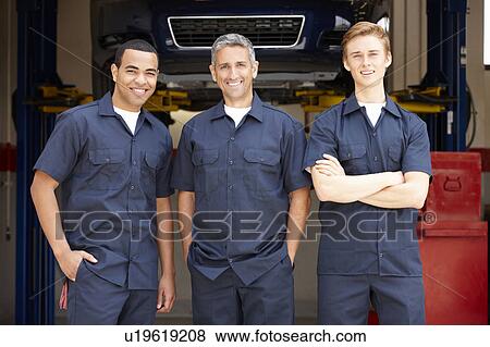 Stock Photo - Mechanics at work. Fotosearch