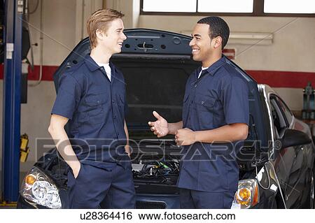Stock Photograph - Mechanics at work. Fotosearch