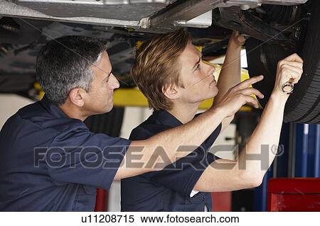 Mechanics at work View Large Photo Image Stock Photography - Mechanics at work. Fotosearch