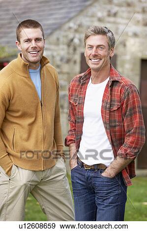 Stock Photo - Men in country garden. Fotosearch