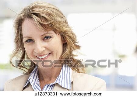 Stock Image - Mid age businesswoman. Fotosearch