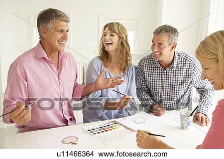 Picture - Mid age couples painting with watercolors. Fotosearch