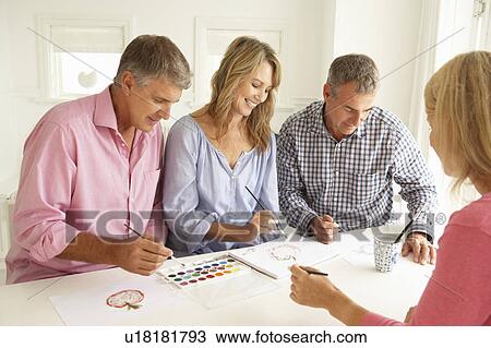 Mid age couples painting with watercolors View Large Photo Image Stock Image - Mid age couples painting with watercolors. Fotosearch