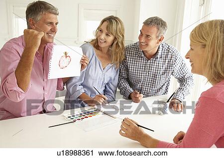 Mid age couples painting with watercolors View Large Photo Image Stock Image - Mid age couples painting with watercolors. Fotosearch