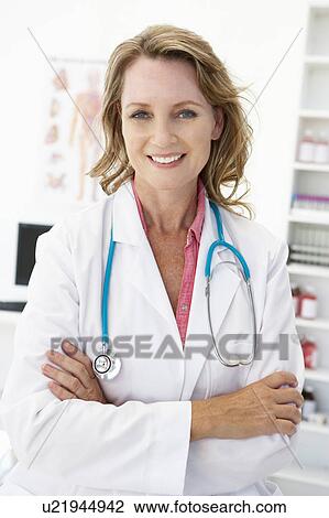 Stock Image - Mid age female doctor. Fotosearch