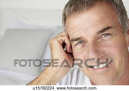 Mid age man head and shoulders View Large Photo Image Picture - Mid age man head and shoulders. Fotosearch