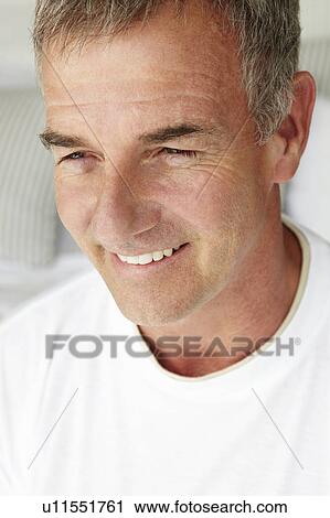 Stock Image - Mid age man head and shoulders. Fotosearch