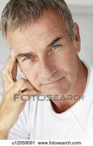 Mid age man head and shoulders View Large Photo Image Stock Image - Mid age man head and shoulders. Fotosearch