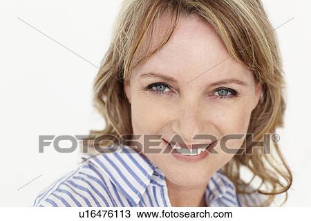 Stock Image - Mid age woman head and shoulders. Fotosearch