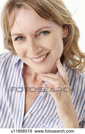 Stock Photo - Mid age woman head and shoulders. Fotosearch