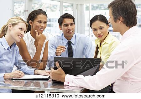 Mixed group in business meeting View Large Photo Image Stock Image - Mixed group in business meeting. Fotosearch