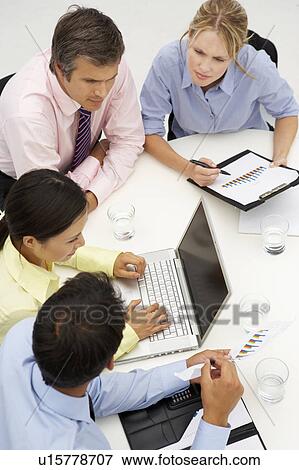 Mixed group in business meeting View Large Photo Image Stock Photo - Mixed group in business meeting. Fotosearch