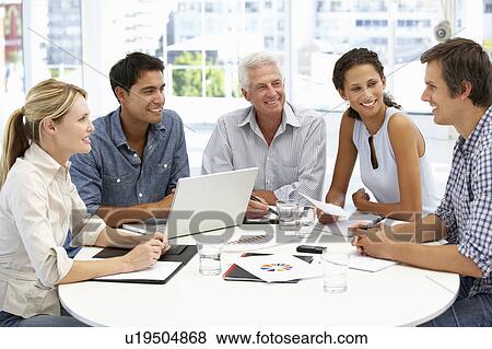 Mixed group in business meeting View Large Photo Image Stock Photo - Mixed group in business meeting. Fotosearch