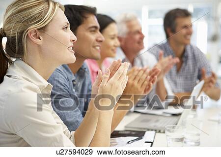 Mixed group in business meeting View Large Photo Image Stock Photo - Mixed group in business meeting. Fotosearch