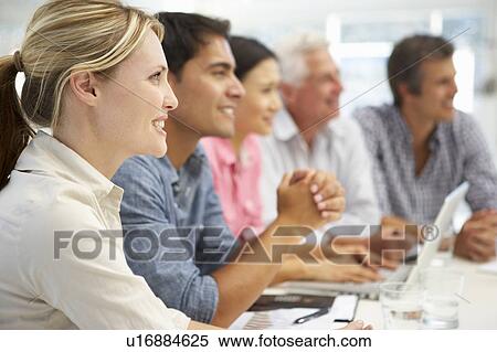 Mixed group in business meeting View Large Photo Image Stock Photography - Mixed group in business meeting. Fotosearch