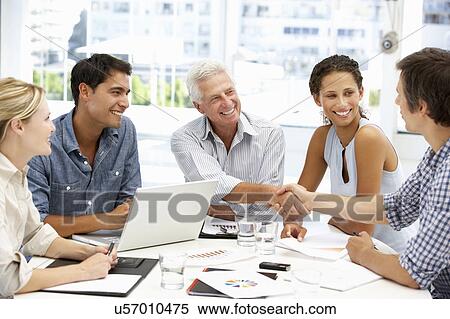 Mixed group in business meeting View Large Photo Image Stock Photography - Mixed group in business meeting. Fotosearch