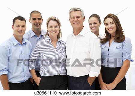 Stock Image - Mixed group of business people. Fotosearch