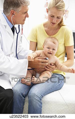 Stock Image - Pediatrician with baby. Fotosearch