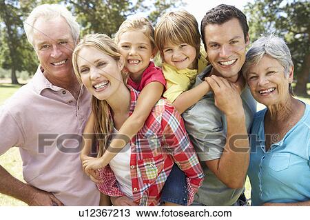 Portrait multi-generation family outdoors View Large Photo Image Stock Image - Portrait multi-generation family outdoors. Fotosearch