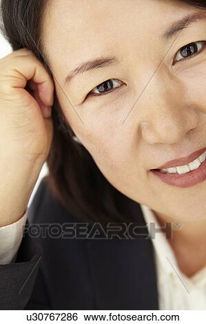 Portrait of business woman in suit View Large Photo Image Stock Photograph - Portrait of business woman in suit. Fotosearch