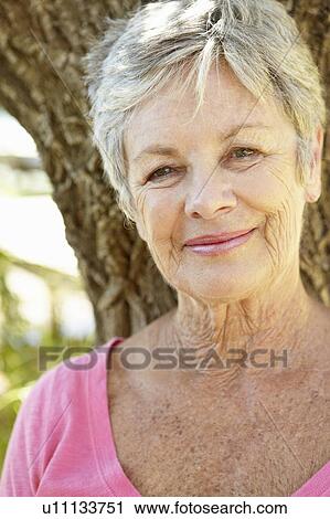 Stock Image - Portrait of senior woman. Fotosearch